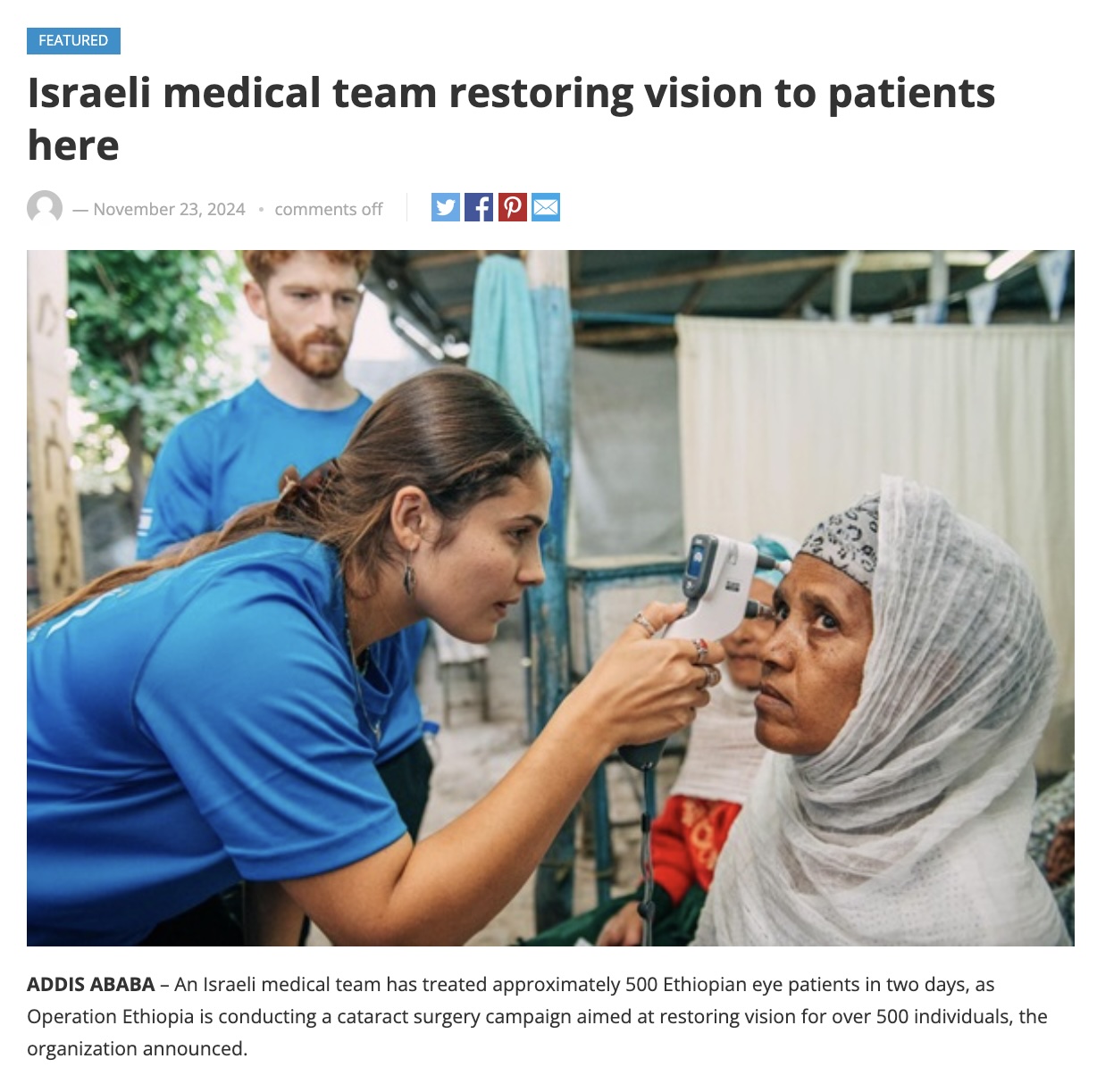 Volunteer checking patient eyes for glaucoma